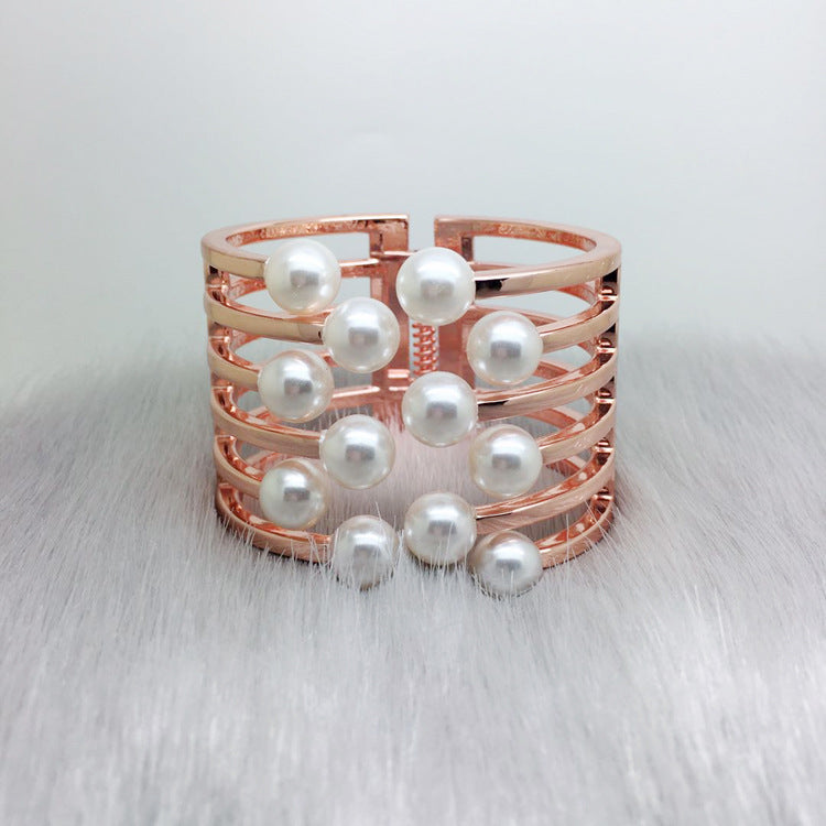 Bracciale geometrico con perle intarsiate