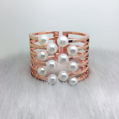 Bracciale geometrico con perle intarsiate